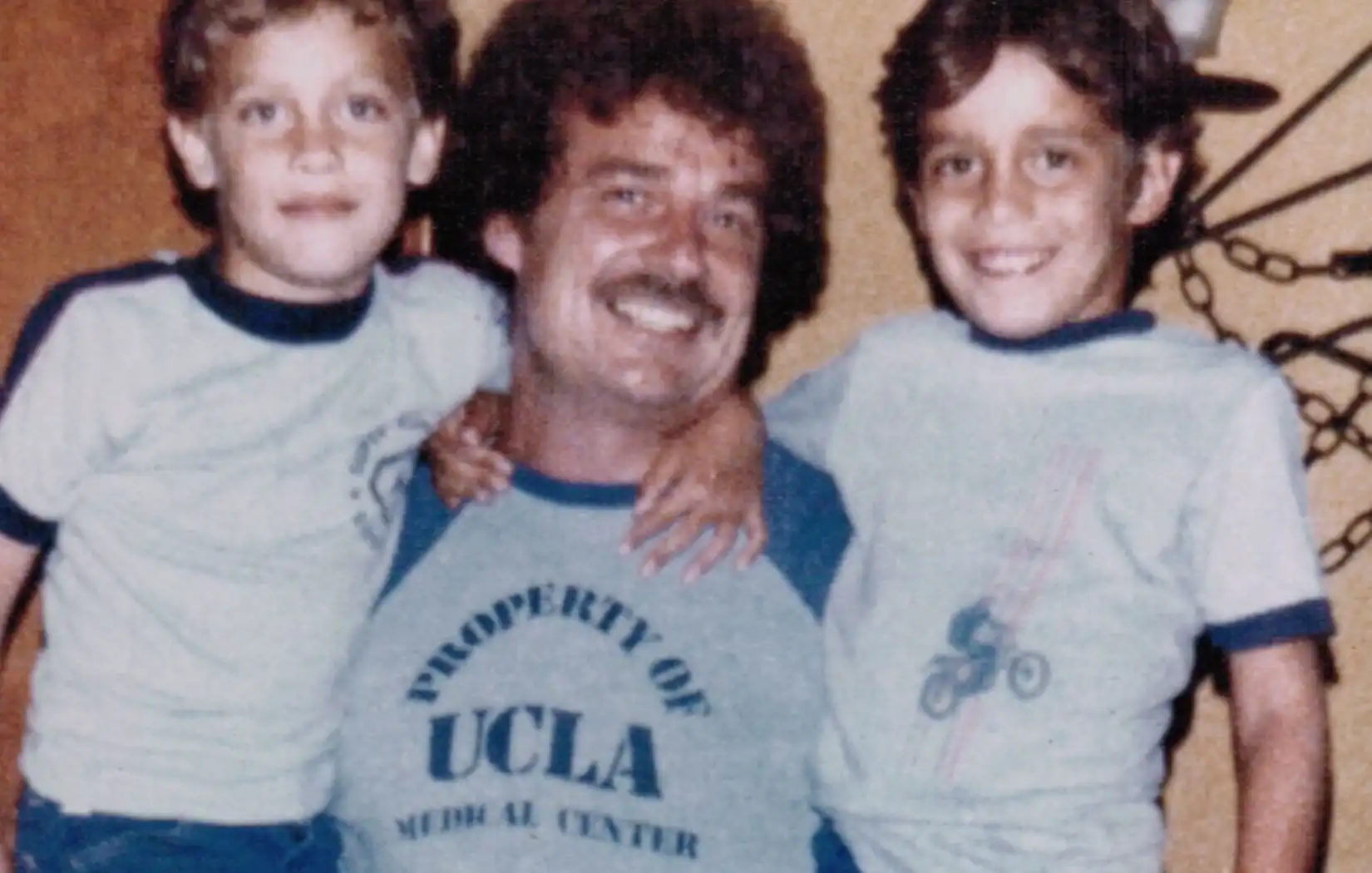 Howard Cyphers, the founder of United Battery, with his sons.