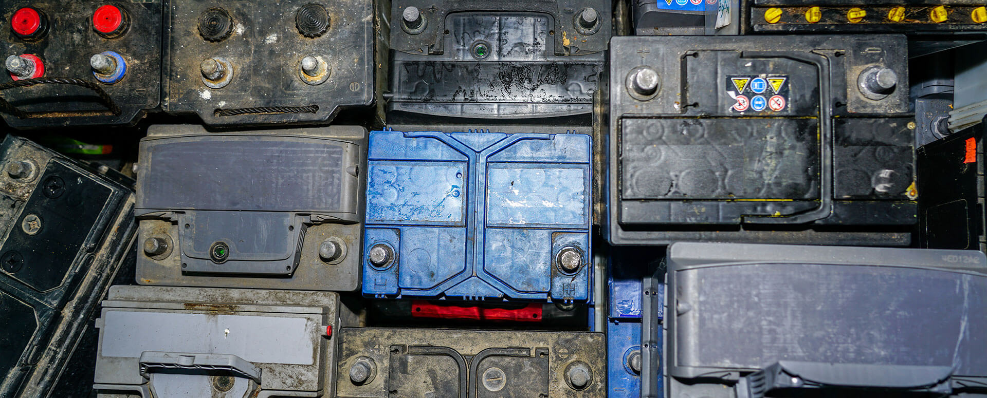 a birdseye image of a group of old, recycled batteries