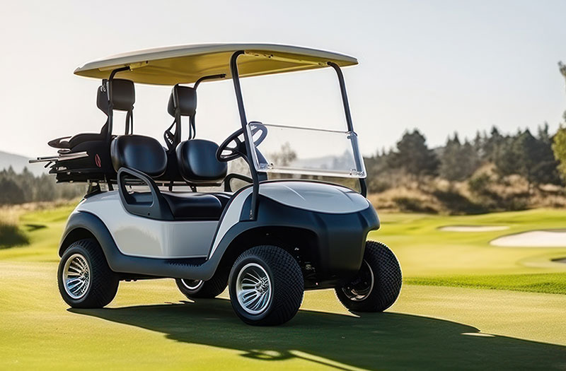 an image of a white golf cart on a course
